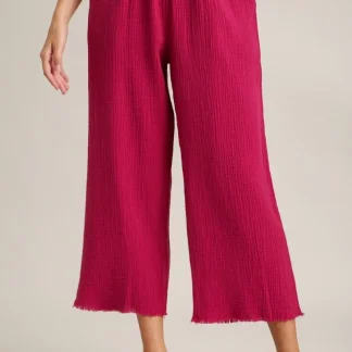 Calça pantalona Umgee tamanho grande com bainha desfiada, cintura elástica e modelagem plus size.